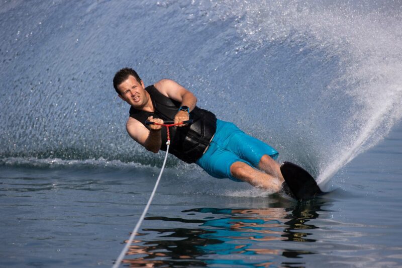 man on ski on lake