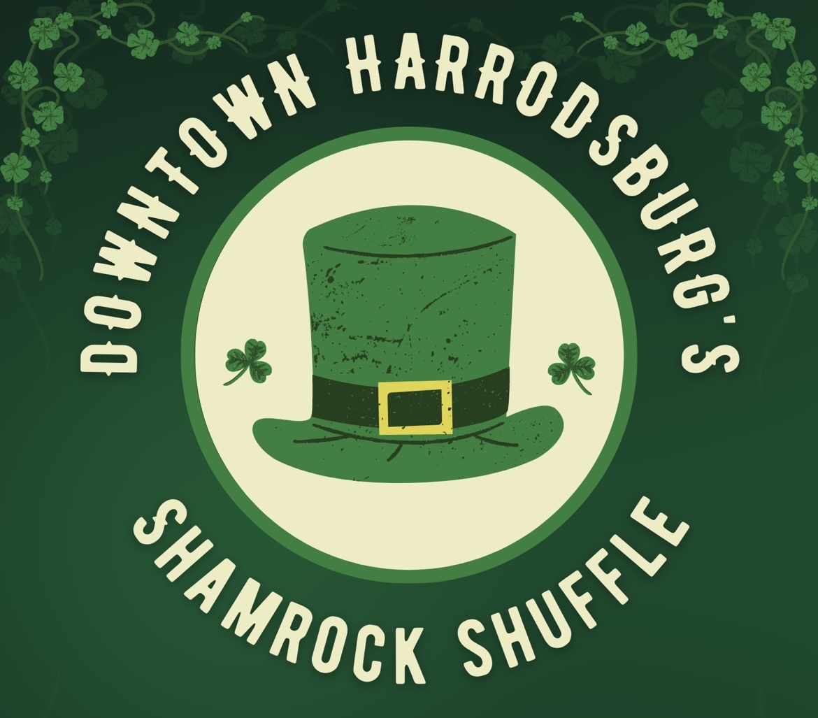 Type graphic with green top hat and clover